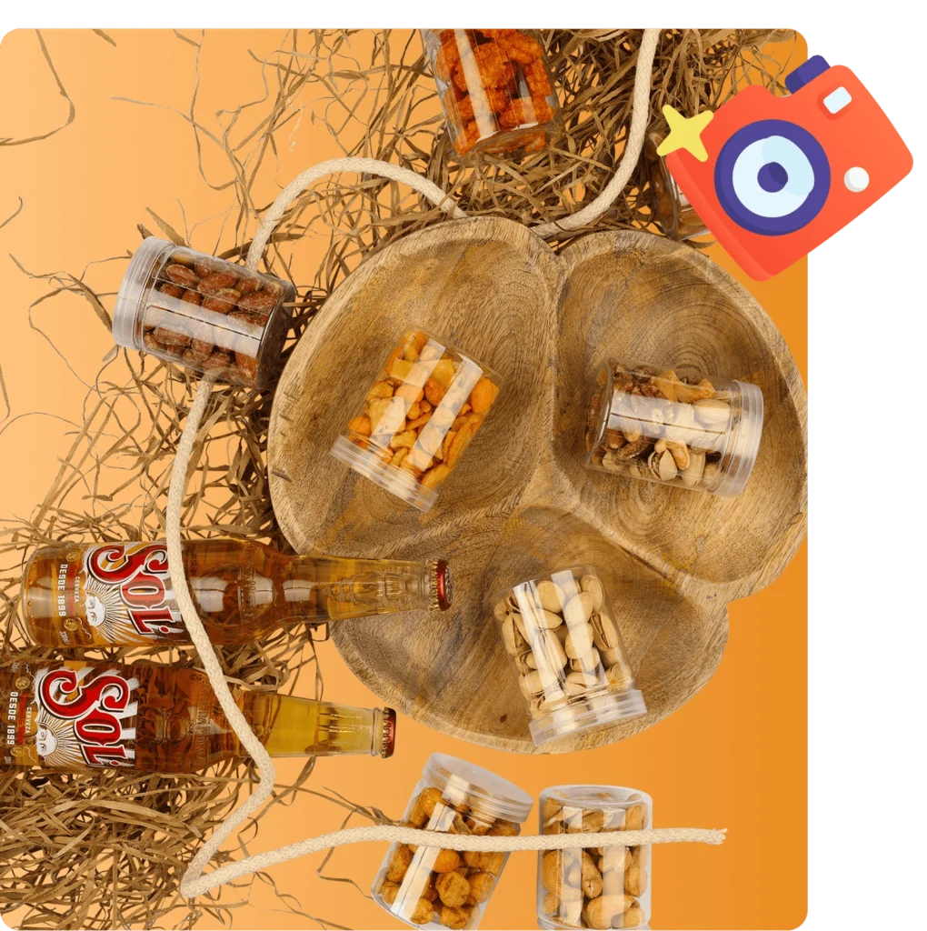Assorted snack jars and two bottles of Sol beer arranged on a rustic wooden platter with straw decor, displayed on an orange background with a camera icon overlay.
