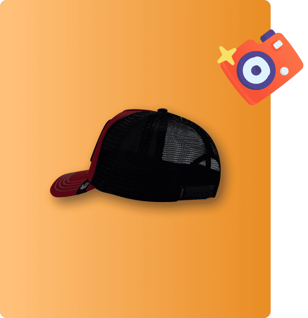 Black mesh trucker cap with red brim on an orange background.