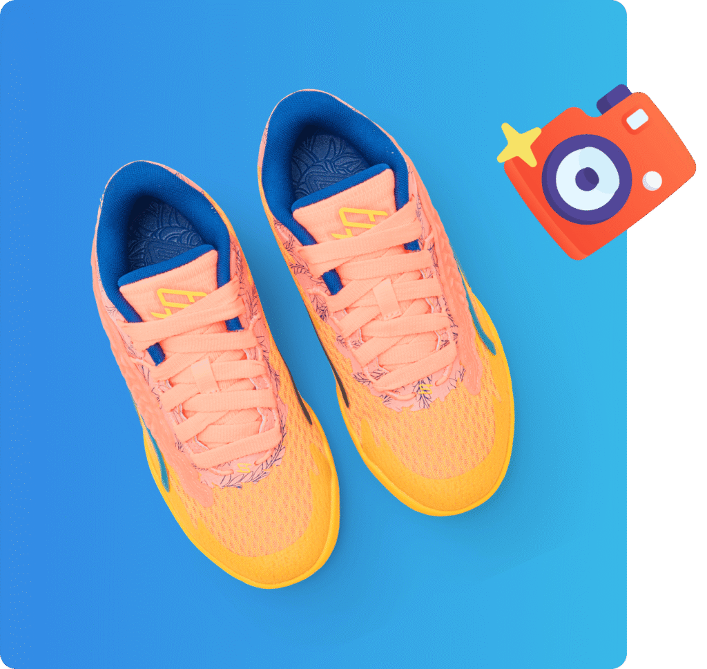 Pair of vibrant orange and yellow sneakers with blue lining on a blue background.