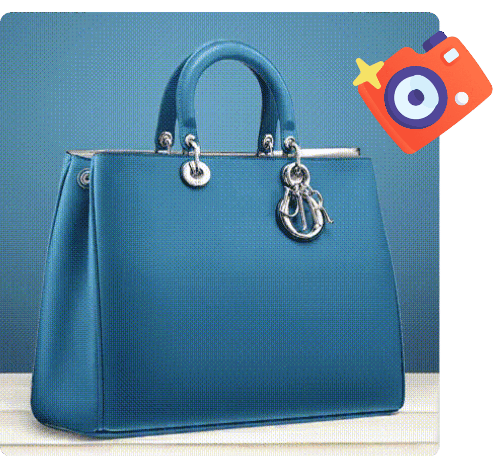 Elegant blue leather handbag with silver hardware and charm on display.