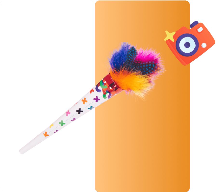 Colorful decorative pen with fluffy feathers isolated on a split white and orange background